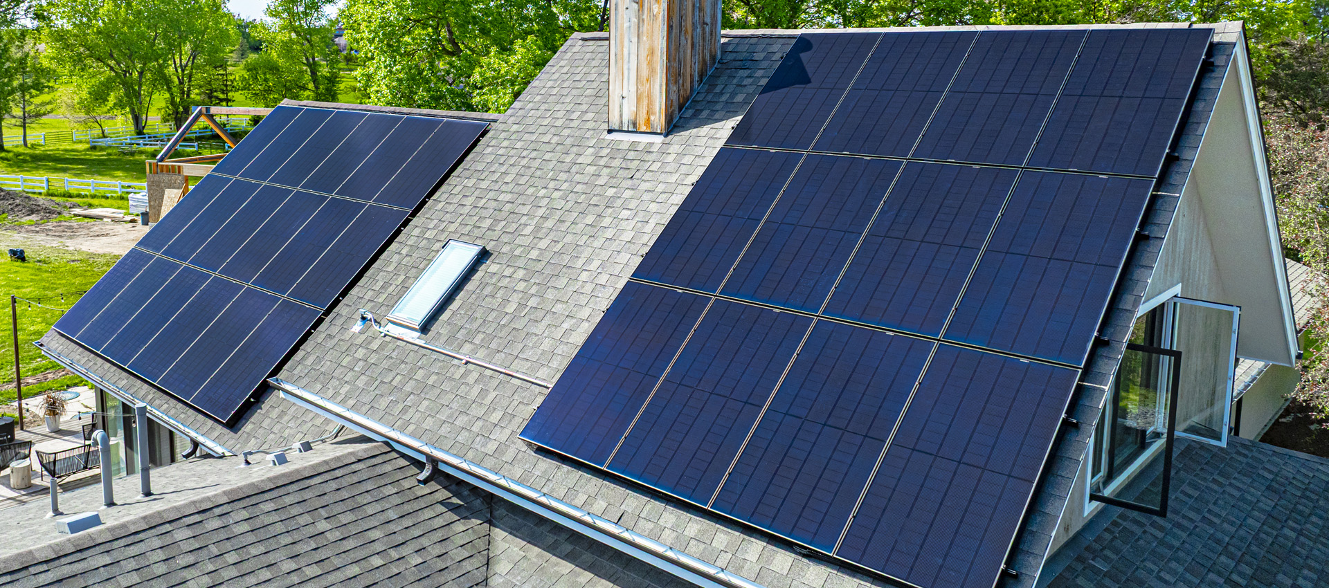 Close up of two solar arrays installed on the roof of Colorado home